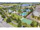 Aerial view of the community pool, offering a relaxing and recreational space for residents at 8679 Laureate Blvd, Orlando, FL 32827