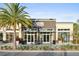 Exterior of community fitness center with modern architecture and ample natural light at 8679 Laureate Blvd, Orlando, FL 32827