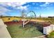 A modern playground features exciting climbing structures, providing a fun and engaging play area for children at 8679 Laureate Blvd, Orlando, FL 32827