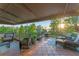 Spacious covered patio with cozy seating, ideal for enjoying the outdoors and scenic views at 8988 Houston Pl # 303, Orlando, FL 32819