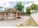 View of the outdoor gazebo, brick patio, and pool, perfect for outdoor entertaining at 100 Crestwood Dr, Longwood, FL 32779