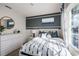 Bright bedroom with a large window and tasteful decor at 1012 Bear Hammock Dr, Umatilla, FL 32784