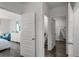 Hallway that offers access to the bathroom, the bedroom and walk-in closet at 1012 Bear Hammock Dr, Umatilla, FL 32784