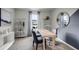 Bright home office featuring a modern desk, decorative shelving, and plenty of natural light at 1012 Bear Hammock Dr, Umatilla, FL 32784