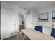 Bright office space with stylish table and neutral tones at 1012 Bear Hammock Dr, Umatilla, FL 32784