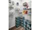 Pantry with wire shelving, stocked with household supplies and refreshments at 1012 Bear Hammock Dr, Umatilla, FL 32784
