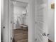 Bright walk-in closet with wire shelving and hardwood flooring at 1012 Bear Hammock Dr, Umatilla, FL 32784