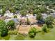 Aerial view of a home with a spacious backyard, wooden deck, and waterfront access at 1103 Saddleback Ridge Rd, Apopka, FL 32703