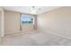 Bedroom with a large window providing natural light to the neutral carpeted interior at 1103 Saddleback Ridge Rd, Apopka, FL 32703