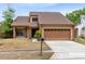 Charming home featuring a two-car garage, well-maintained landscaping and neutral stucco exterior at 1103 Saddleback Ridge Rd, Apopka, FL 32703