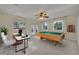 Bright game room with pool table, desk area, and natural light from multiple windows at 1231 Glastonberry Rd, Maitland, FL 32751