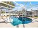 Screened-in swimming pool with clear blue water and fun inflatable toys at 1231 Glastonberry Rd, Maitland, FL 32751