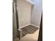 Modern bathroom features an enclosed shower, wood floors, and neutral tones at 135 Orchid Dr, Davenport, FL 33897