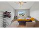 Cozy bedroom with storage, a ceiling fan, and a sunny window at 135 Orchid Dr, Davenport, FL 33897