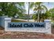 Welcome to Island Club West: An attractive sign shows a warm invite to the community at 135 Orchid Dr, Davenport, FL 33897