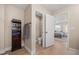Hallway bathroom with a toilet and neutral paint at 14742 Bahama Swallow Blvd, Winter Garden, FL 34787