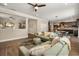 Comfortable living room boasts an open layout with views of dining area and kitchen, ideal for Gathering gatherings at 14742 Bahama Swallow Blvd, Winter Garden, FL 34787