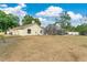 Expansive backyard featuring a screened-in pool, perfect for outdoor enjoyment and entertaining at 1512 Adriatic Dr, Ocoee, FL 34761