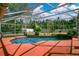 Sparkling screened pool surrounded by a deck providing an inviting outdoor space for leisure at 1512 Adriatic Dr, Ocoee, FL 34761