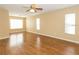 Large living room with wood floors and neutral color walls at 173 Donner Dr, Winter Garden, FL 34787