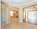 Open-concept living spaces with a combination of tile and hardwood flooring and neutral paint at 173 Donner Dr, Winter Garden, FL 34787