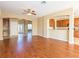 Expansive open living space with hardwood flooring and access to the kitchen at 173 Donner Dr, Winter Garden, FL 34787