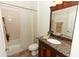 Bathroom featuring granite countertops, a mirror, and a shower/tub combination at 1937 Crystal Downs Ct, Oviedo, FL 32765