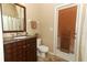 Bathroom featuring a vanity with granite countertop, toilet, and shower/tub combination at 1937 Crystal Downs Ct, Oviedo, FL 32765