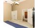Bedroom with carpeted floors, ceiling fan, and ensuite bathroom at 1937 Crystal Downs Ct, Oviedo, FL 32765