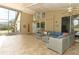Expansive lanai with comfortable seating, ceiling fans, and views of the outdoors at 1937 Crystal Downs Ct, Oviedo, FL 32765
