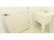 The laundry room includes a utility sink, perfect for quick cleanups and laundry needs at 1937 Crystal Downs Ct, Oviedo, FL 32765