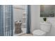 Clean bathroom with a walk-in shower, patterned shower curtain, and modern fixtures at 2052 Monteverde Ave, Davenport, FL 33837