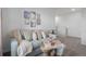 Comfortable living room with a large sofa, decorative pillows, and an inviting atmosphere at 2052 Monteverde Ave, Davenport, FL 33837