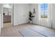 Inviting yoga room with natural light, yoga mats, and ample space for exercise and meditation at 2052 Monteverde Ave, Davenport, FL 33837