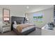 Cozy bedroom features a large window and modern decor at 207 Taylor Groves Dr, Lake Wales, FL 33898