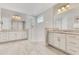 Bathroom with double vanity, granite countertops, and glass-enclosed shower at 2127 Bay Line Rd, Oakland, FL 34787