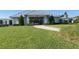 Clubhouse at entrance with a manicured lawn and walkway, offering a welcoming space at 2127 Bay Line Rd, Oakland, FL 34787