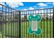 Dog park rules sign within a fenced dog run, ensuring a safe and enjoyable experience for pet owners at 2127 Bay Line Rd, Oakland, FL 34787