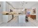 Bright kitchen with stainless steel appliances, granite countertops, and a center island with seating at 2127 Bay Line Rd, Oakland, FL 34787