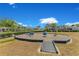 Community playground equipment with surrounding residential houses, creating a neighborhood park at 2127 Bay Line Rd, Oakland, FL 34787
