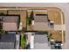 Aerial perspective displaying the roof, yard, and placement of the house within the community at 2164 Rj Cir, Kissimmee, FL 34744