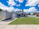 Attractive single-story home featuring a well-kept yard and a convenient attached garage at 2164 Rj Cir, Kissimmee, FL 34744
