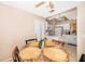 Open floor plan kitchen showcases white cabinets, modern appliances, and breakfast bar seating at 2164 Rj Cir, Kissimmee, FL 34744