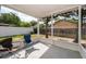 This screened in patio provides a relaxing space for outdoor seating and views of the fenced backyard at 2164 Rj Cir, Kissimmee, FL 34744