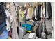 Walk in closet with wire shelving and various articles of clothing at 2203 Gopher Tortoise Ter, Oakland, FL 34787