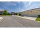 Exterior showcasing a multi-car garage and manicured landscaping in a desirable neighborhood at 2203 Gopher Tortoise Ter, Oakland, FL 34787