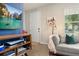 Bright living room featuring stylish decor, modern furnishings, and ample natural light at 2203 Gopher Tortoise Ter, Oakland, FL 34787