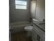 Renovated bathroom with tiled shower and tub, new vanity, and modern fixtures at 225 W 2Nd St, Chuluota, FL 32766