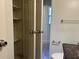 Bathroom with shelving and granite counters at 2886 Carew Ave, Winter Park, FL 32789