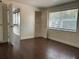 Bedroom showing wood floors, a window, and access to adjoining rooms at 2886 Carew Ave, Winter Park, FL 32789